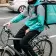 Oxford_United_Kingdom_Mar_3_3017_Side_view_of_young_male_cyclist_delivering_food_fast_to_client_via_Deliveroo_App_commuting_fast_in_the_university_city_with_big_thermo_bag_with_Deliveroo_logo
